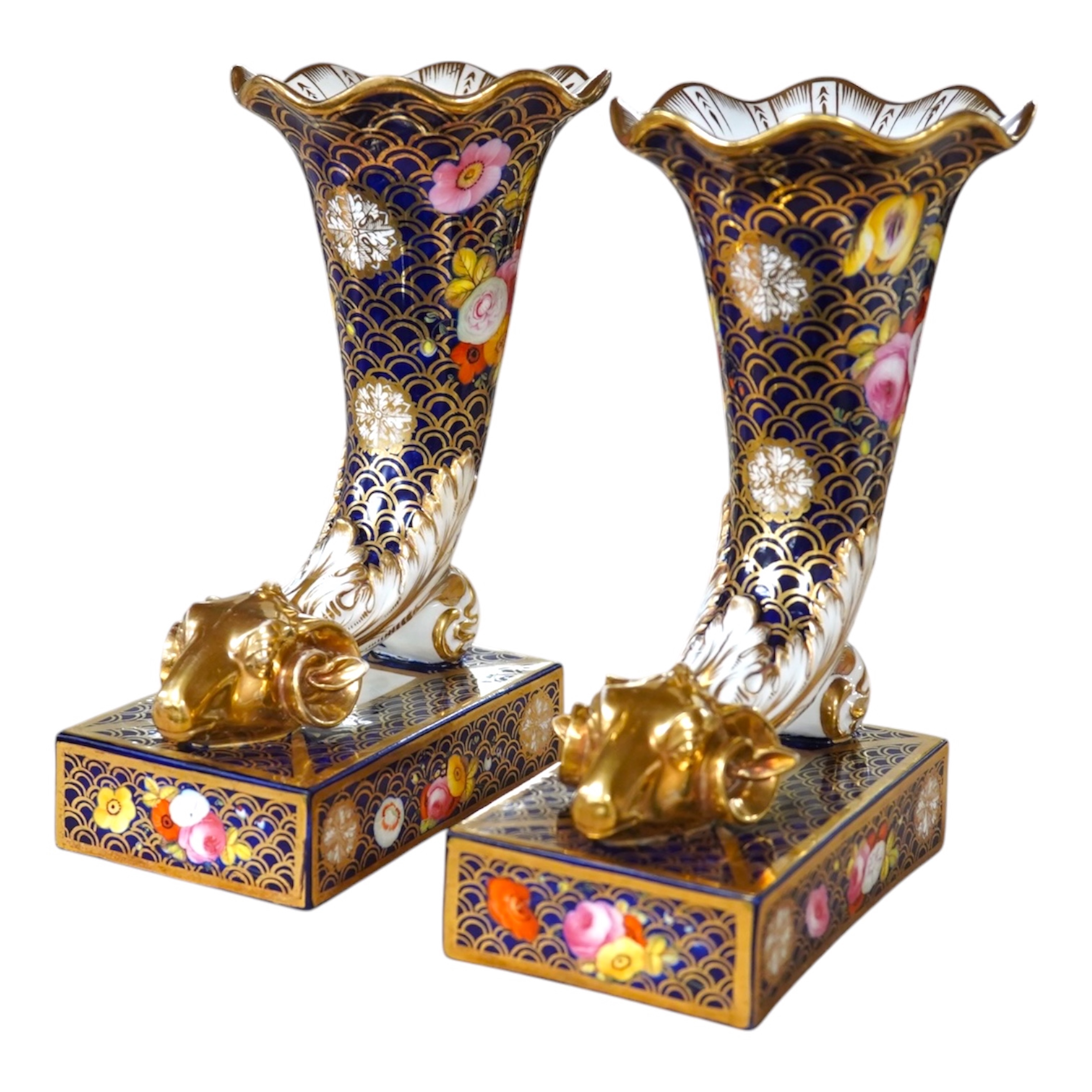 A pair of Spode-type cornucopia vases, 18cm high (a.f.). Condition - restored